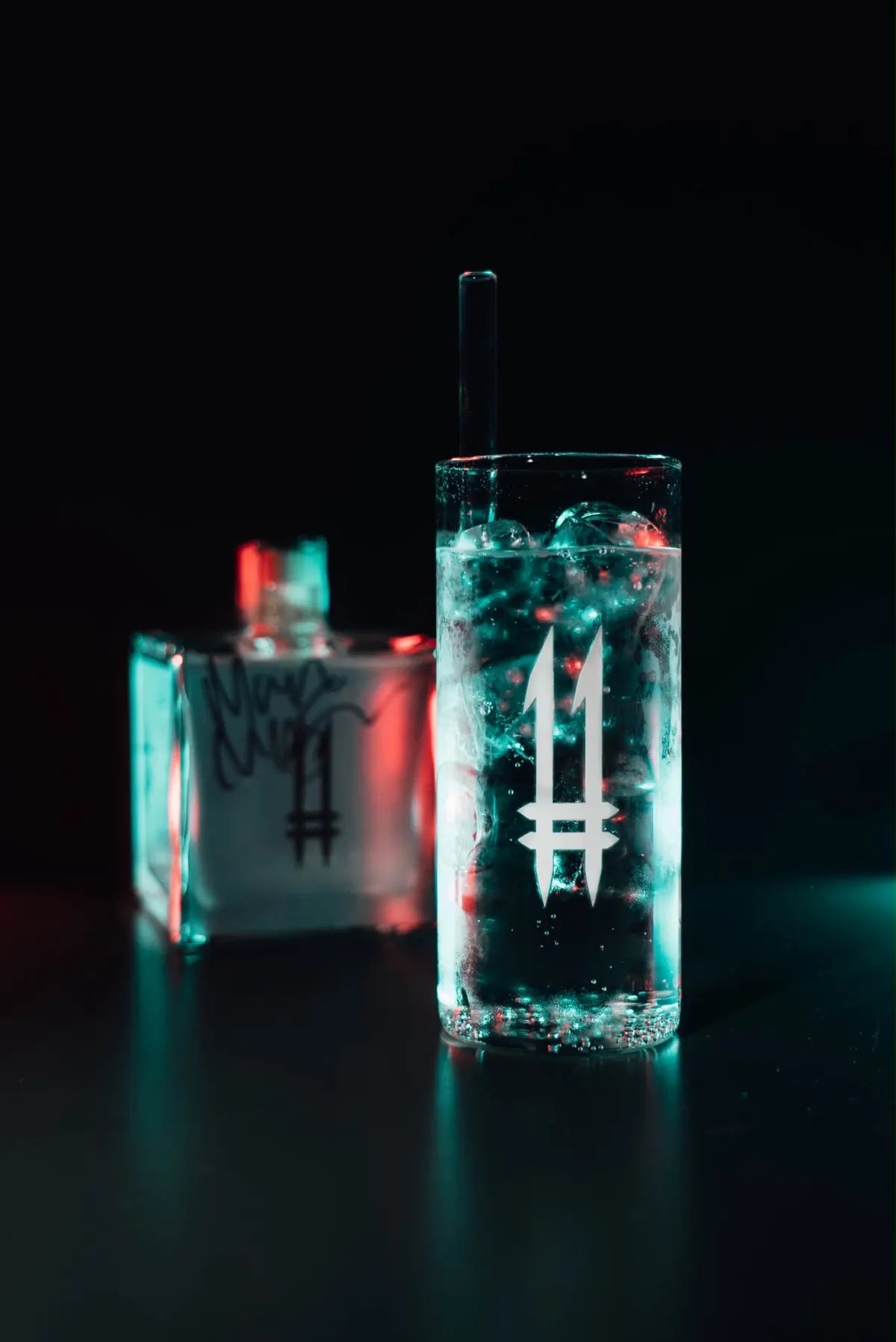 Gin and tonic with N.11 London Dry Gin in a glass with the 11 logo
